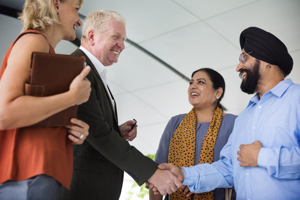 Business People Shaking Hands Agreement Concept